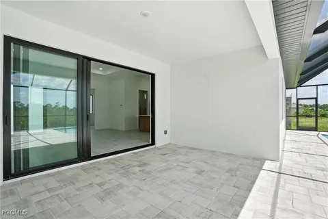 a view of an empty room with a balcony