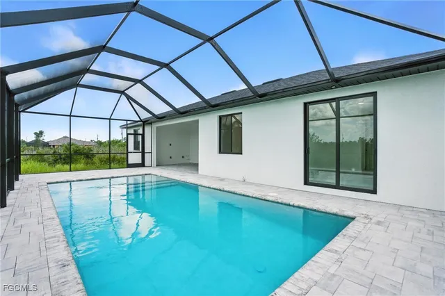 a view of an empty room with a balcony