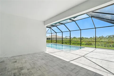 a view of a swimming pool with a porch