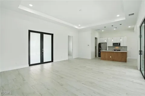 a view of a kitchen with a sink