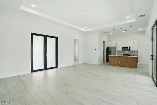 a view of a kitchen with a sink