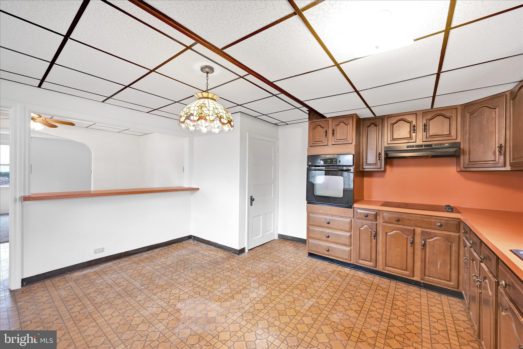 1211 River Road Quarryville, PA 17566 - Photo 13 of 33 a kitchen with stainless steel appliances granite countertop a refrigerator and a stove