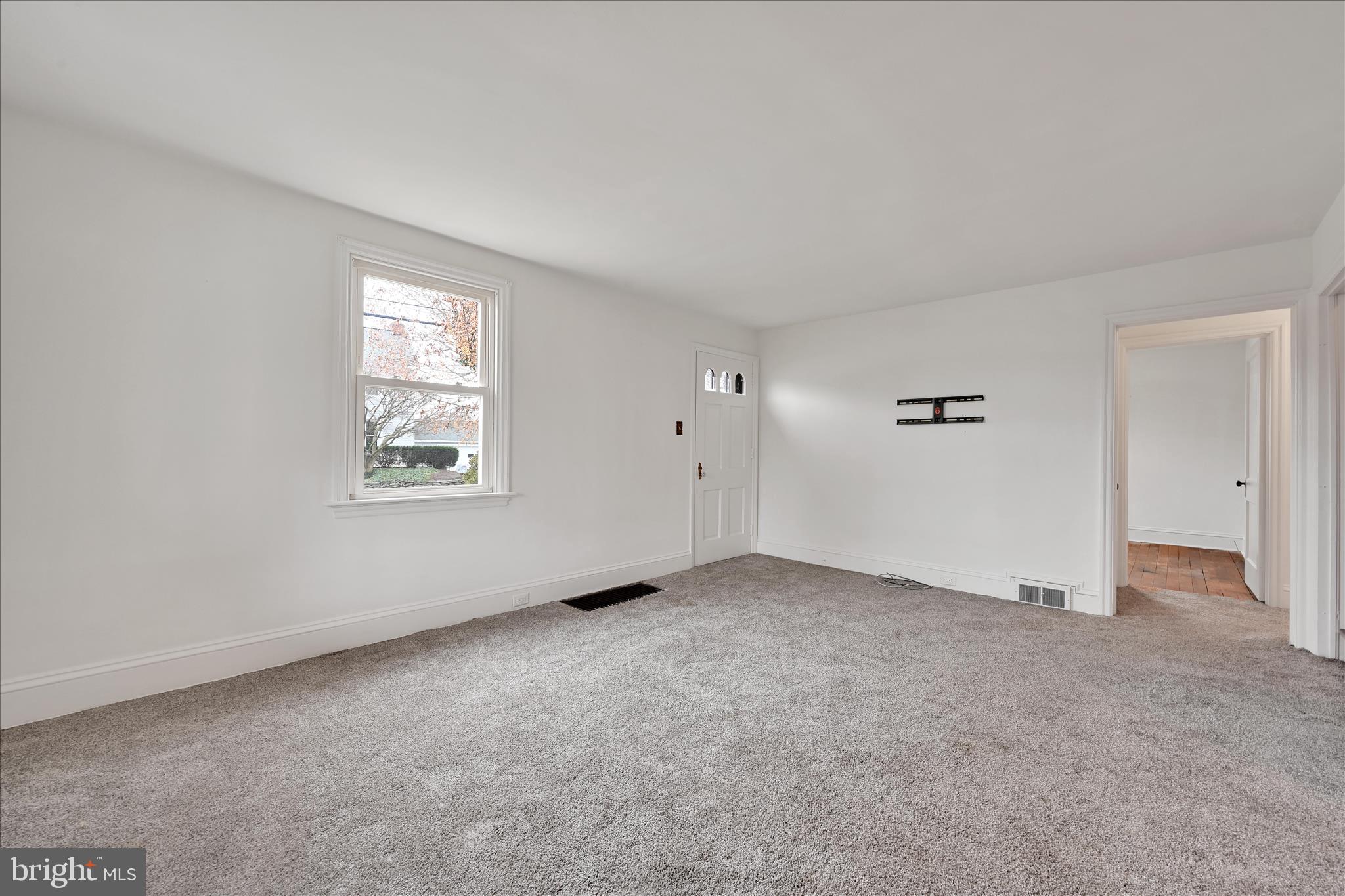 1211 River Road Quarryville, PA 17566 - Photo 9 of 33 an empty room with windows