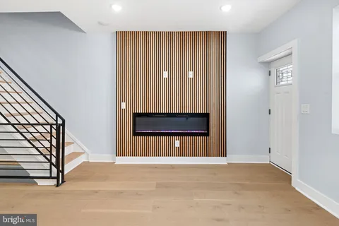 a view of a livingroom with a staircase