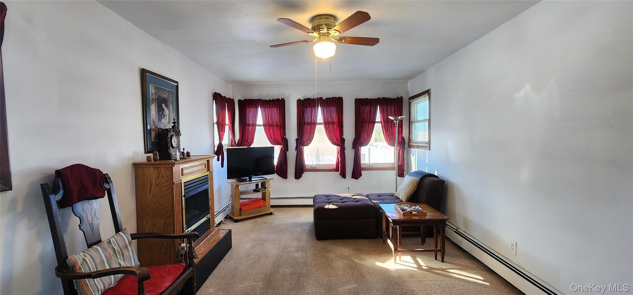 22 Blue Point Road Mastic Beach, NY 11951 - Photo 12 of 23 a view of a workspace with furniture and a window