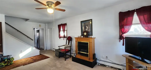 a view of workspace with furniture and a window