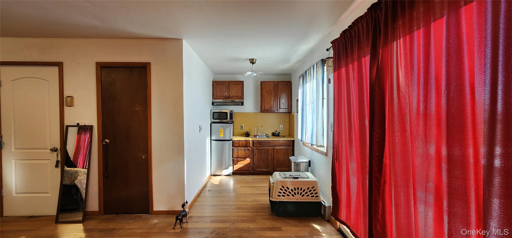 22 Blue Point Road Mastic Beach, NY 11951 - Photo 16 of 23 a view of a kitchen from the hallway