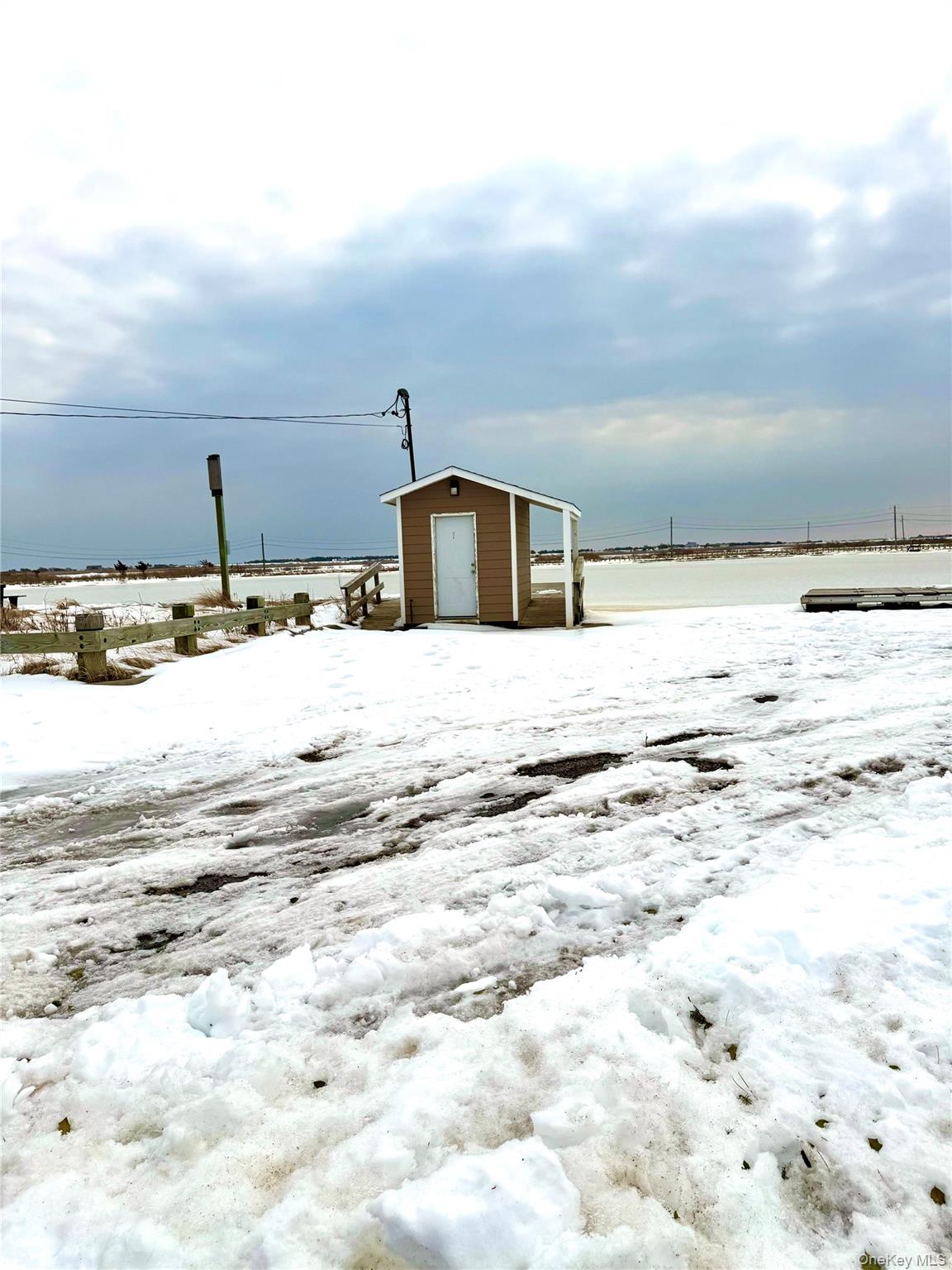 22 Blue Point Road Mastic Beach, NY 11951 - Photo 24 of 29 a view of ocean with beach