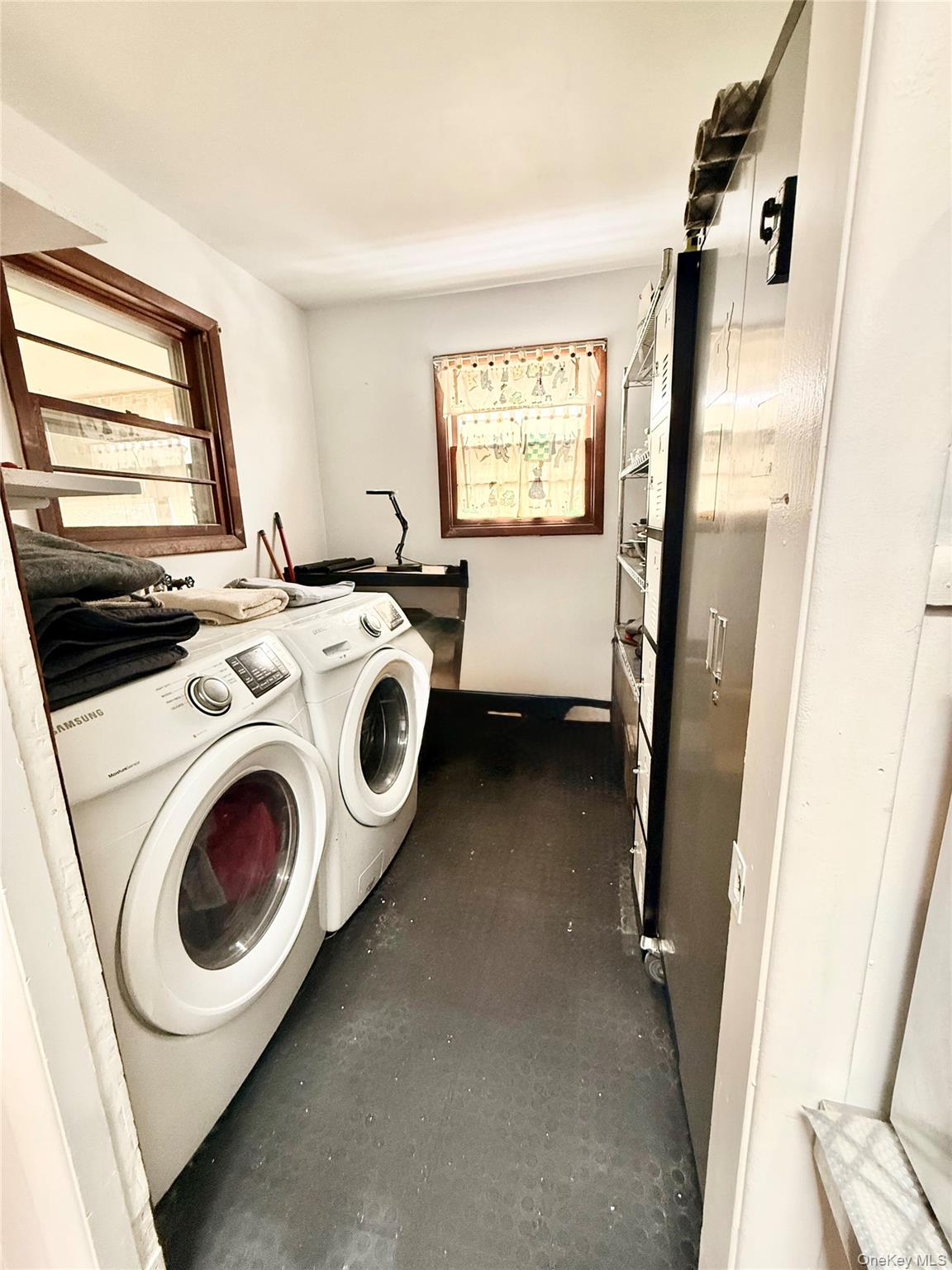 22 Blue Point Road Mastic Beach, NY 11951 - Photo 7 of 29 a utility room with dryer and washer