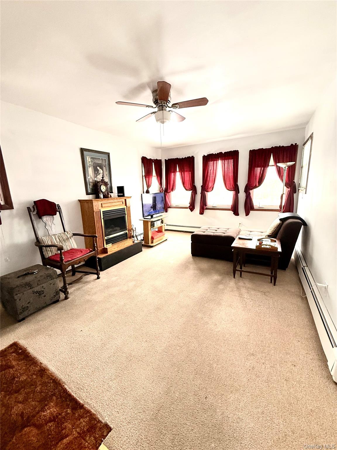 22 Blue Point Road Mastic Beach, NY 11951 - Photo 10 of 29 a living room with furniture