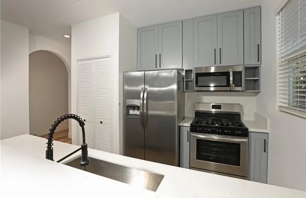 a view of a hallway with washer and dryer