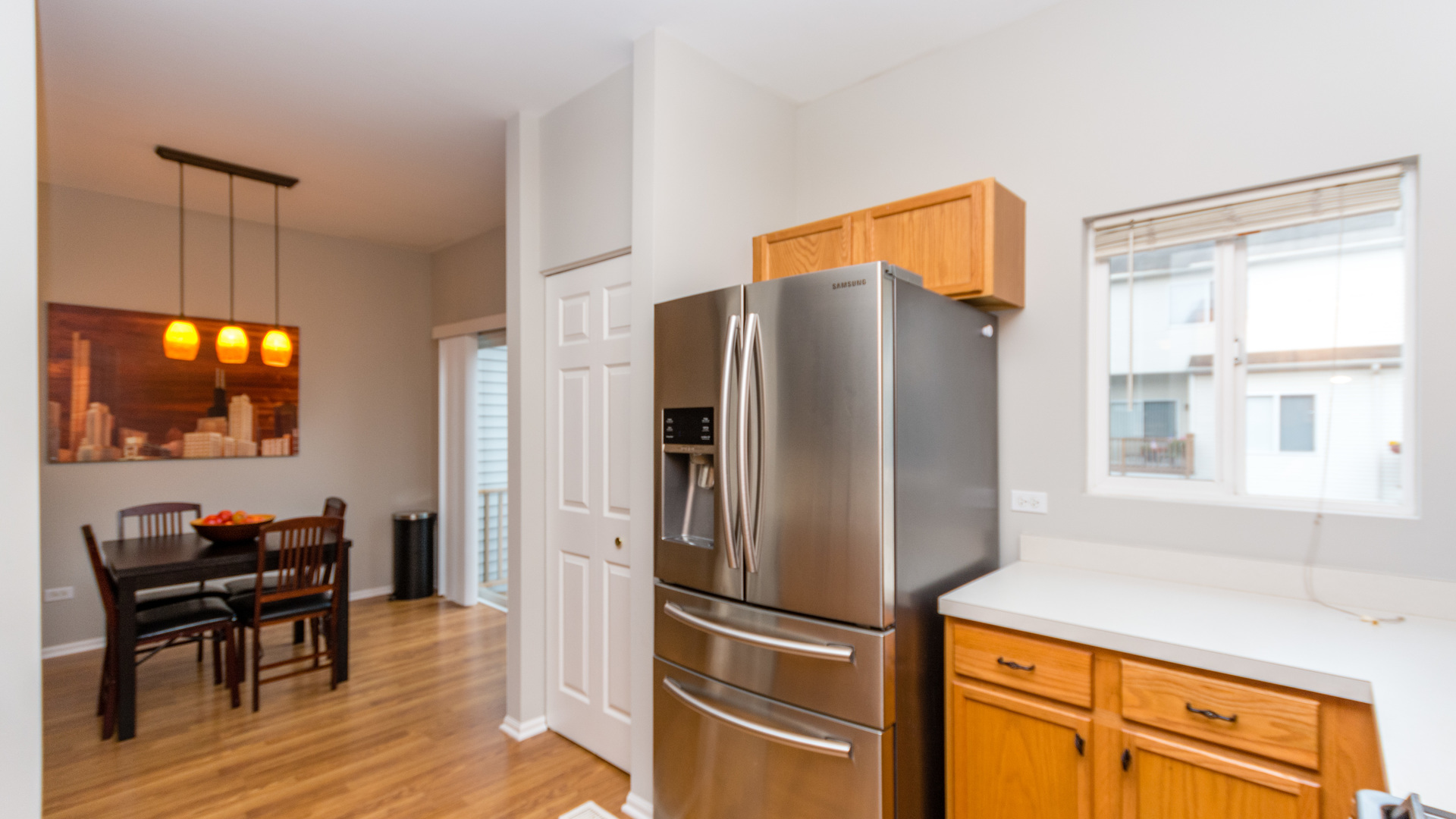 141 Enclave Circle, Unit B Bolingbrook, IL 60440 - Photo 14 of 41 a kitchen with stainless steel appliances a refrigerator and a stove top oven