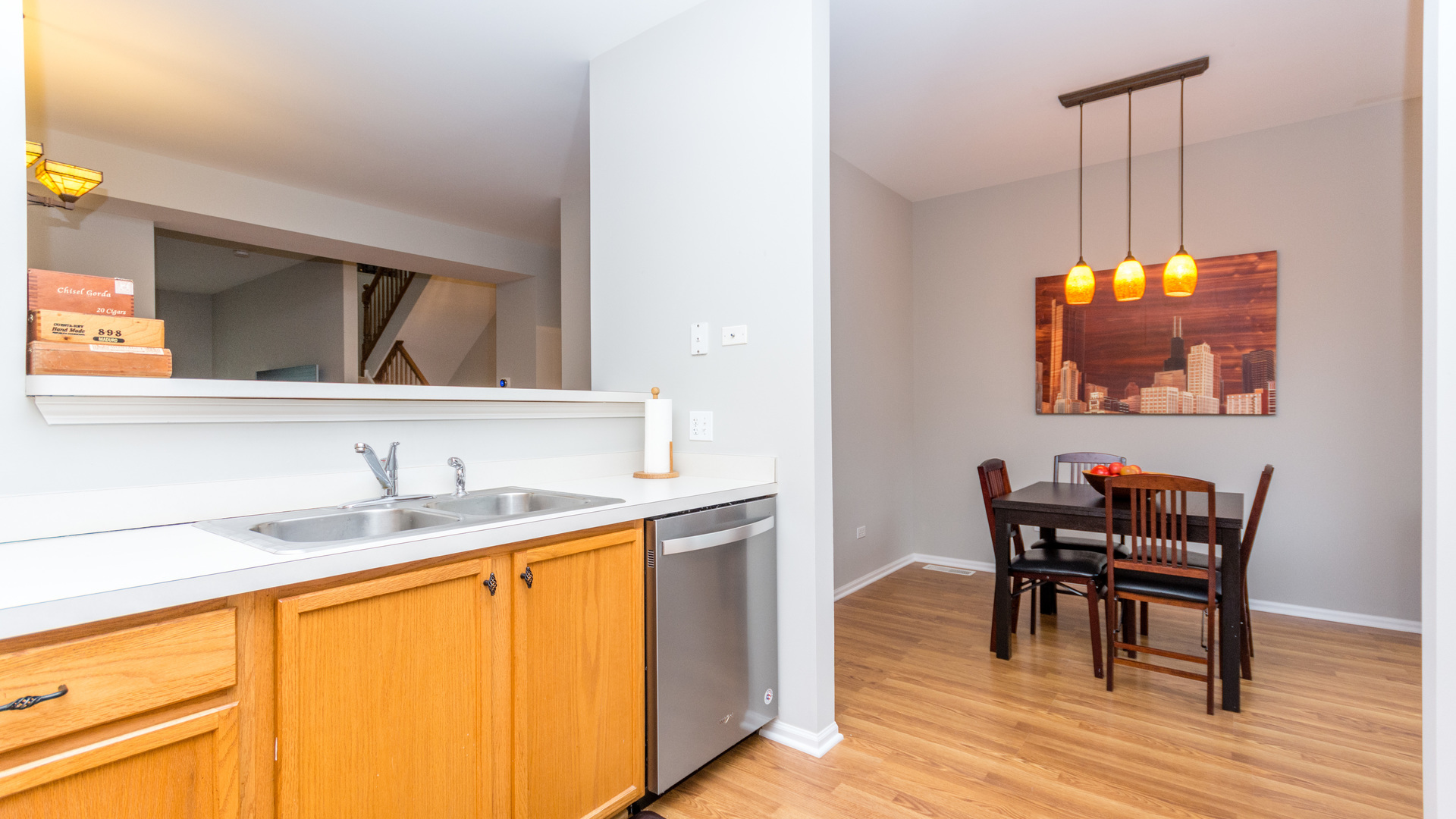 141 Enclave Circle, Unit B Bolingbrook, IL 60440 - Photo 15 of 41 a dining room with a table and chairs