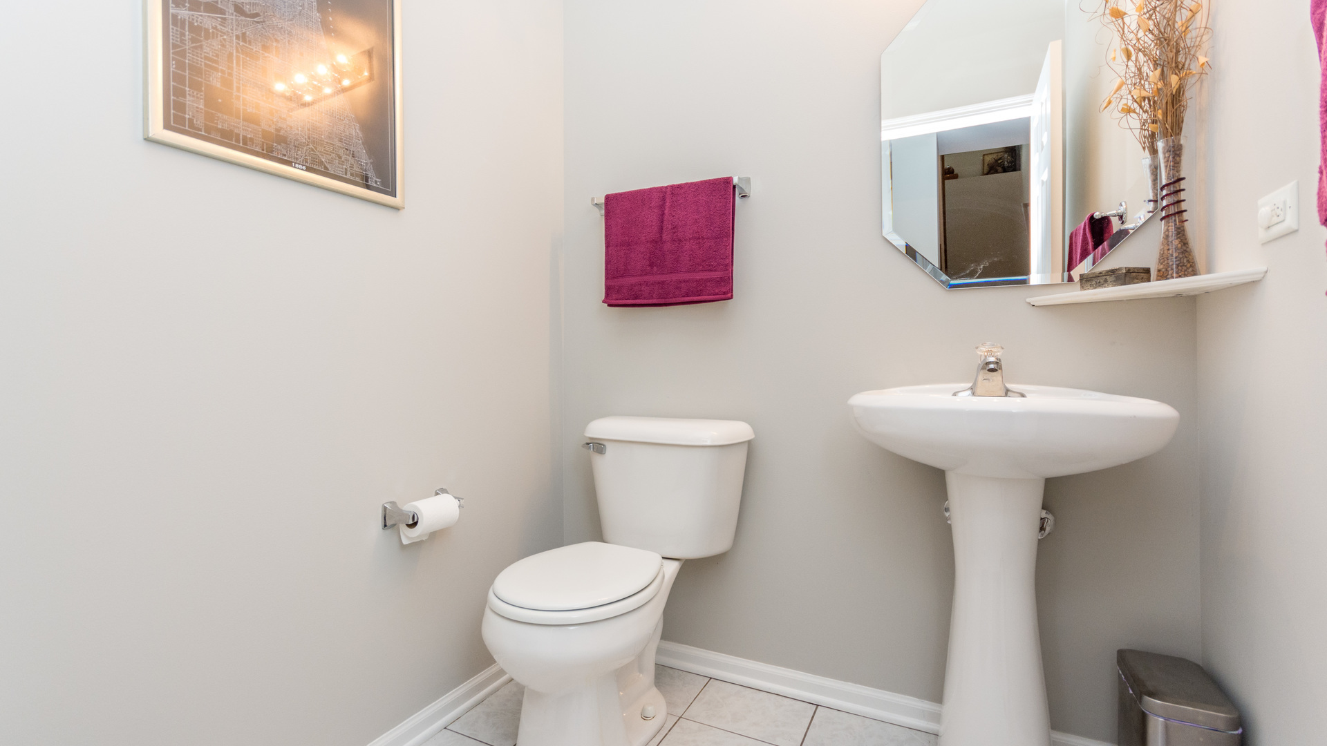 141 Enclave Circle, Unit B Bolingbrook, IL 60440 - Photo 19 of 41 a bathroom with a toilet sink and mirror