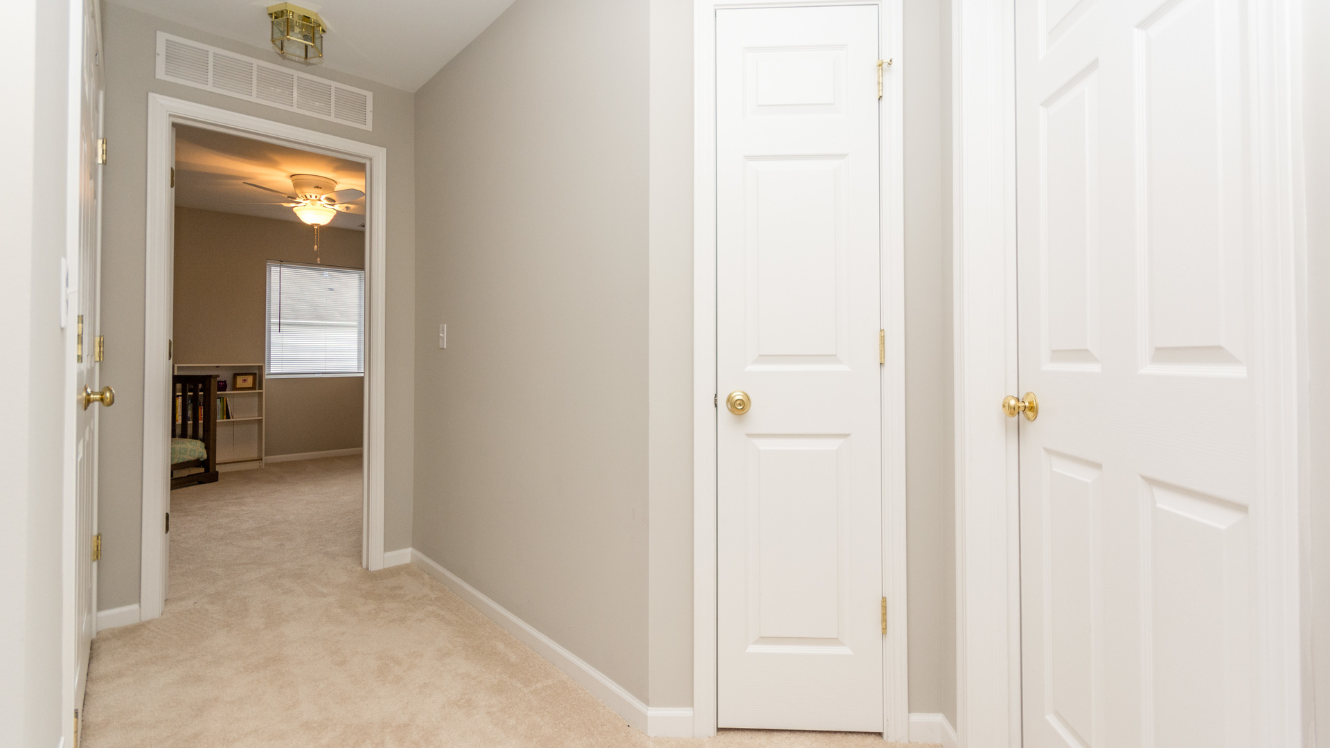 141 Enclave Circle, Unit B Bolingbrook, IL 60440 - Photo 24 of 41 a view of a bedroom from a hallway