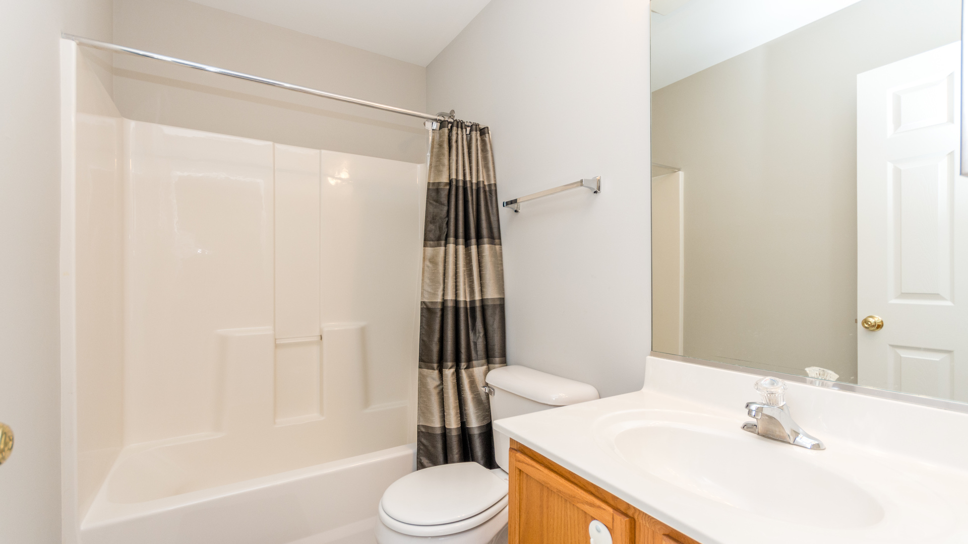 141 Enclave Circle, Unit B Bolingbrook, IL 60440 - Photo 30 of 41 a bathroom with a sink toilet and shower