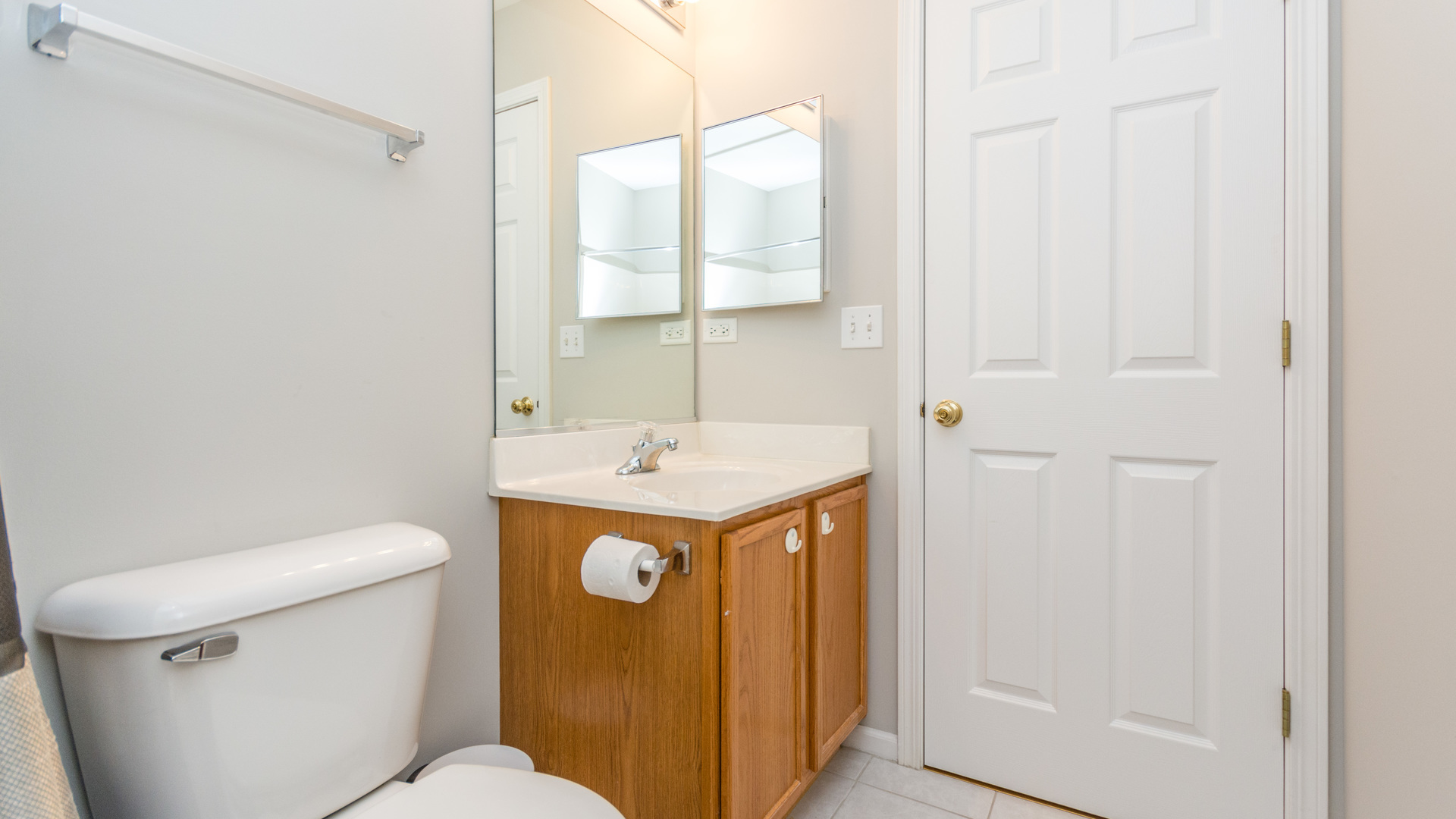 141 Enclave Circle, Unit B Bolingbrook, IL 60440 - Photo 31 of 41 a bathroom with a sink a toilet and shower