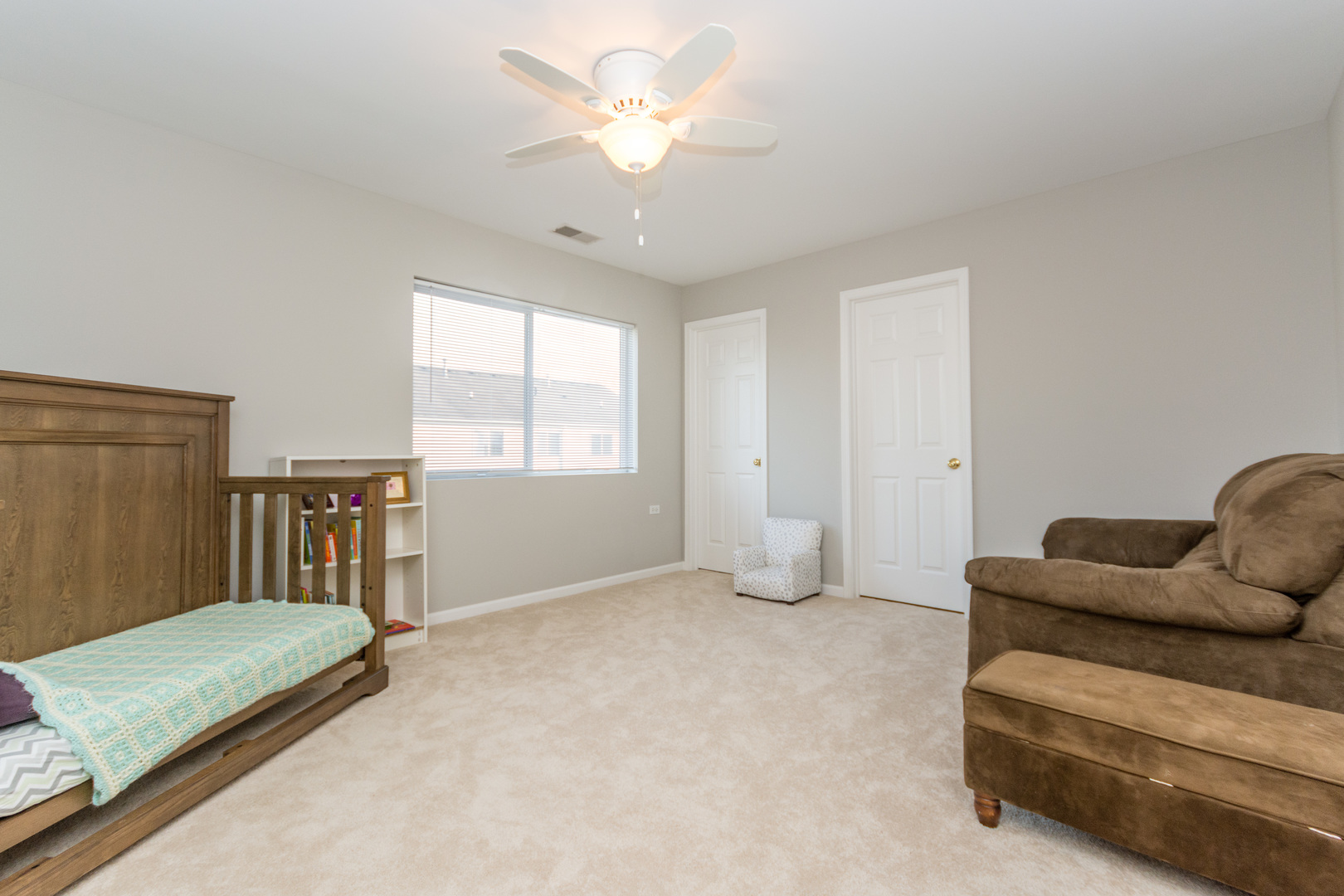 141 Enclave Circle, Unit B Bolingbrook, IL 60440 - Photo 36 of 41 a living room with furniture and a window
