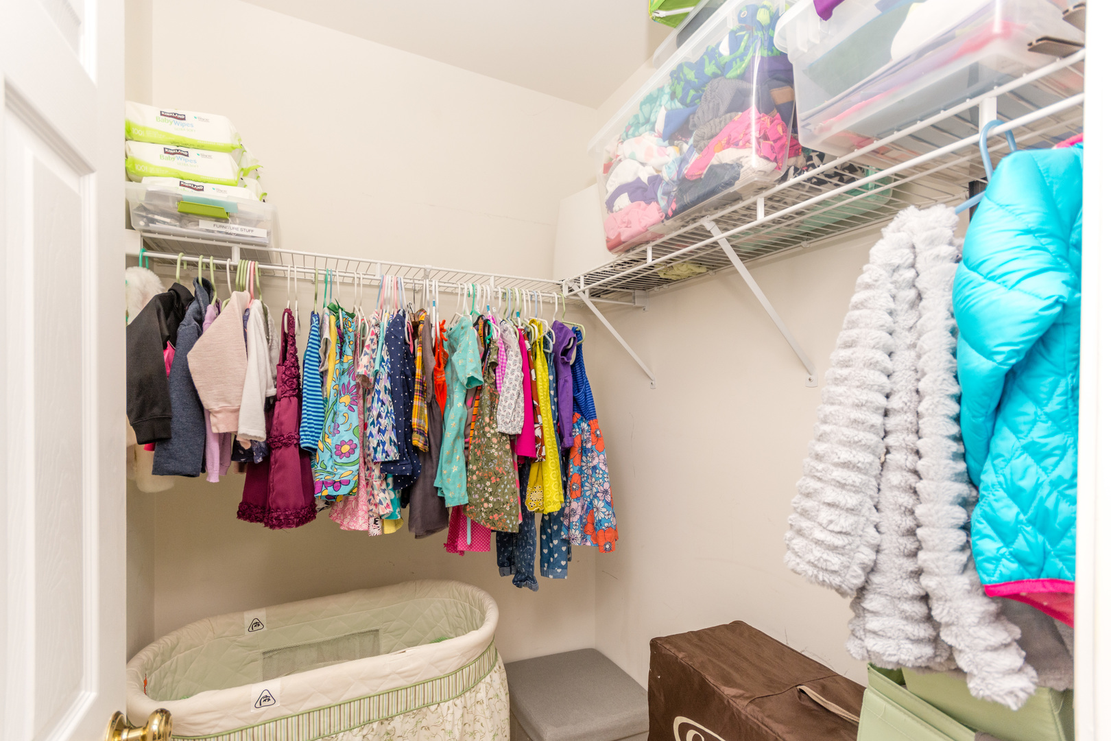 141 Enclave Circle, Unit B Bolingbrook, IL 60440 - Photo 38 of 41 a view of walk in closet with clothes and shoes