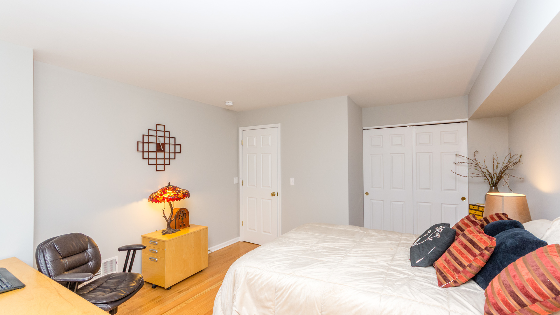 141 Enclave Circle, Unit B Bolingbrook, IL 60440 - Photo 41 of 41 a bedroom with a bed and a couch