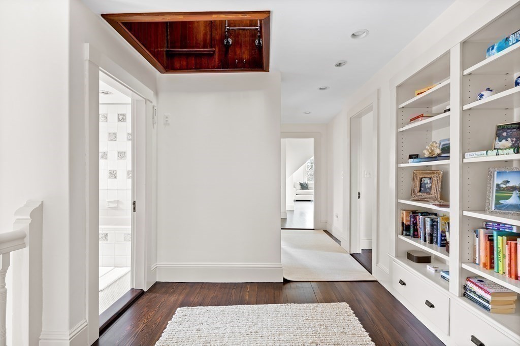 15 Old Neck Road Manchester, MA 01944 - Photo 19 of 24 a view of a hallway with closet and wooden floor