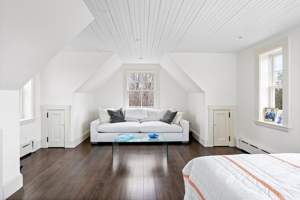 15 Old Neck Road Manchester, MA 01944 - Photo 22 of 24 a bedroom with furniture and a wooden floor