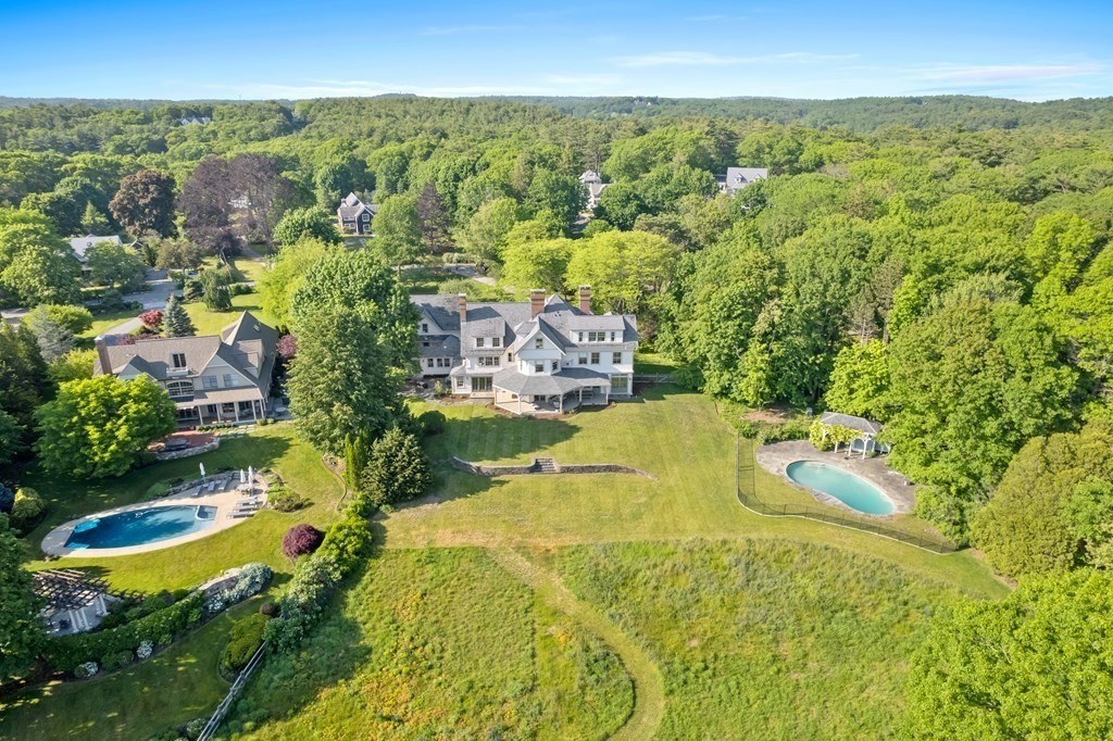 15 Old Neck Road Manchester, MA 01944 - Photo 24 of 24 an aerial view of residential houses with outdoor space and swimming pool