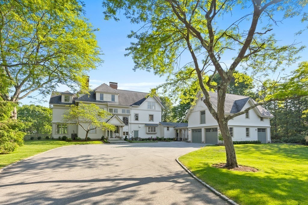 15 Old Neck Road Manchester, MA 01944 - Photo 3 of 24 a front view of a house with a yard