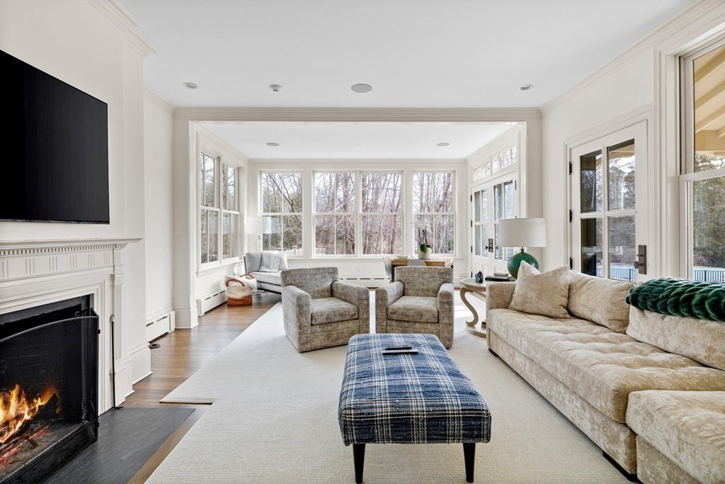 15 Old Neck Road Manchester, MA 01944 - Photo 8 of 24 a living room with furniture fireplace and flat screen tv