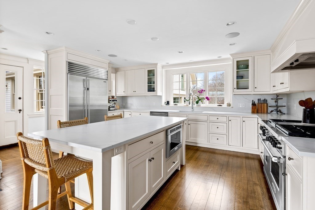 15 Old Neck Road Manchester, MA 01944 - Photo 10 of 24 a kitchen with a sink appliances cabinets and a counter top space