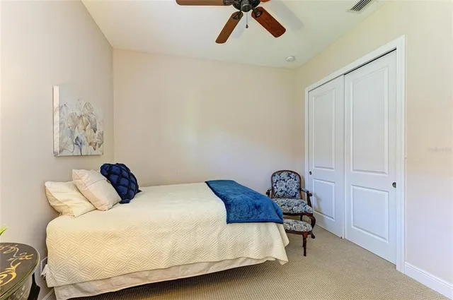 a view of a swimming pool with a house in the background