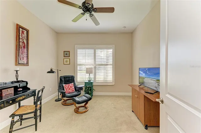 a view of a patio with a dining table and chairs