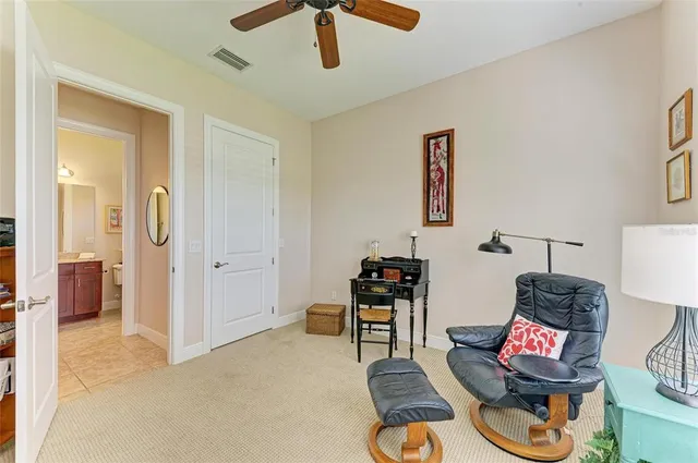 an aerial view of residential houses with outdoor space and swimming pool