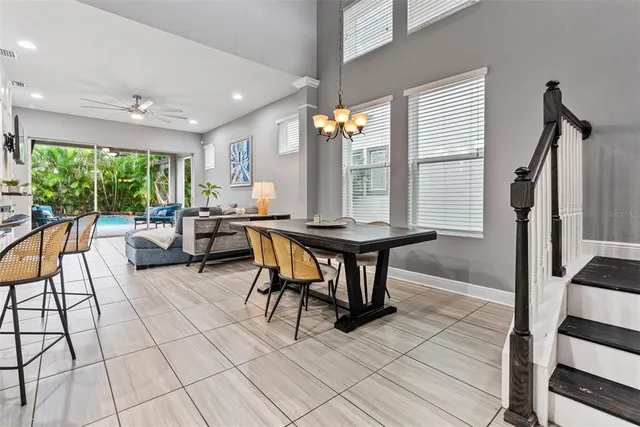 a view of a dining room with furniture window and outside view