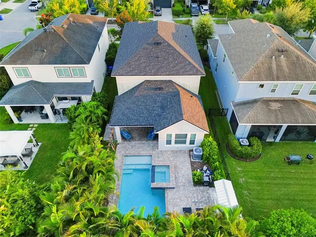 an aerial view of a house with garden