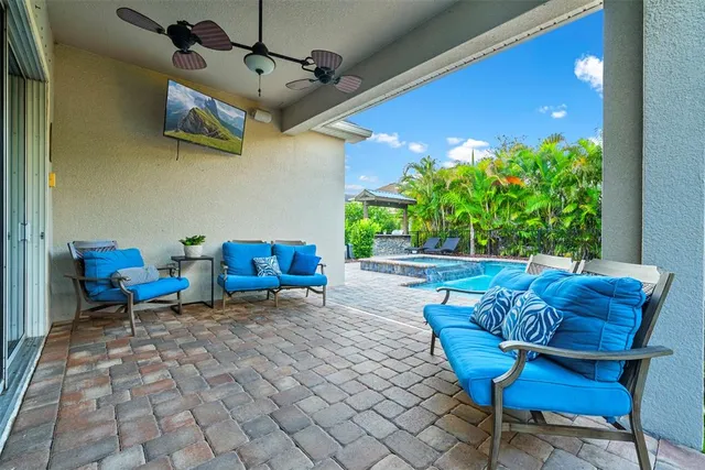a living room with patio furniture