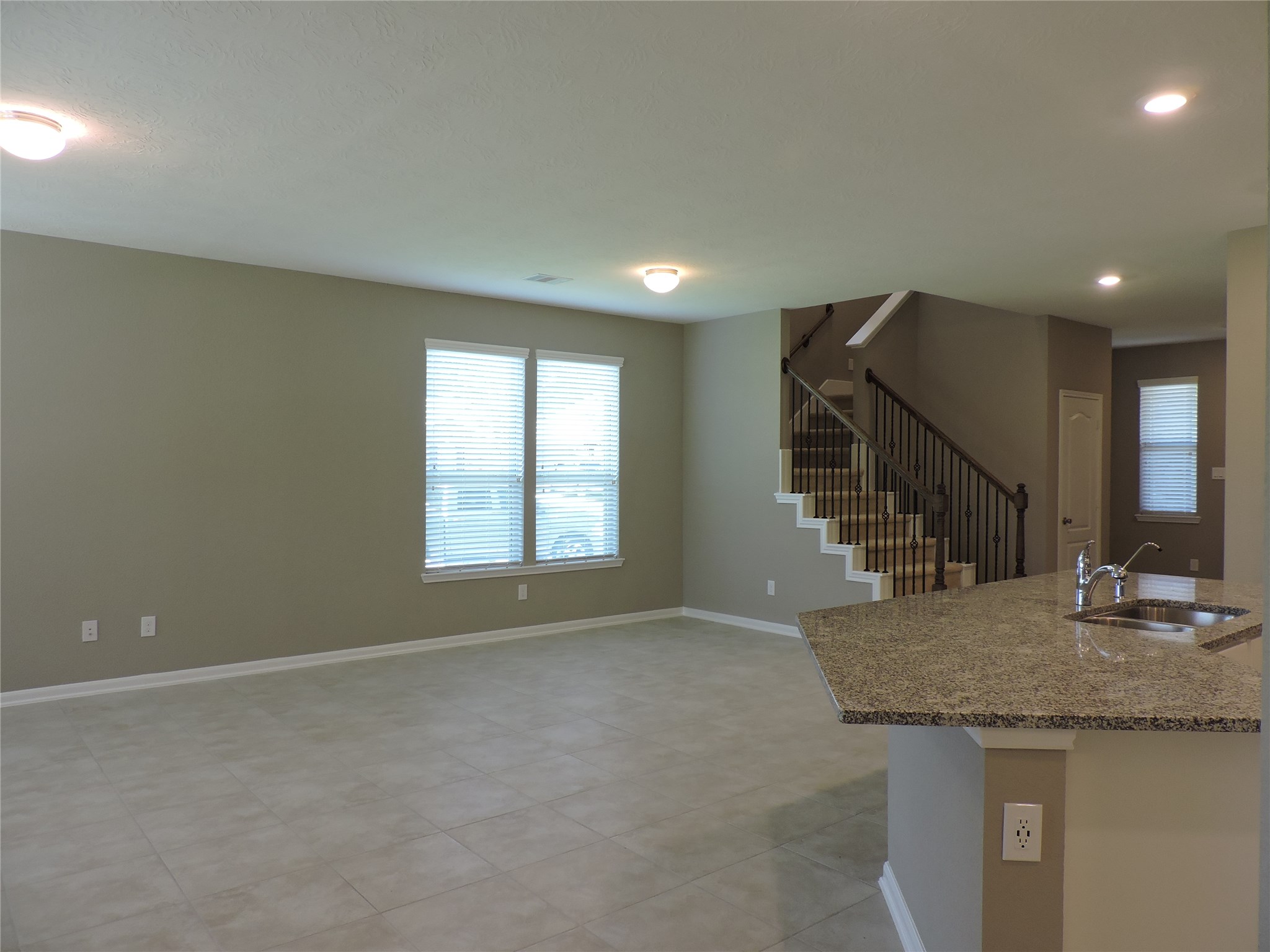 1102 Upton Court Conroe, TX 77304 - Photo 5 of 30 a view of entryway and kitchen
