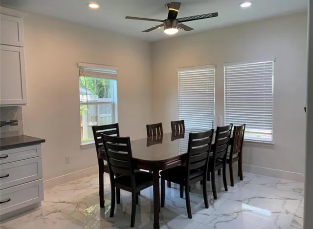 a view of a dining room with furniture