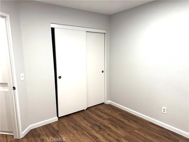 a view of small space with wooden floor