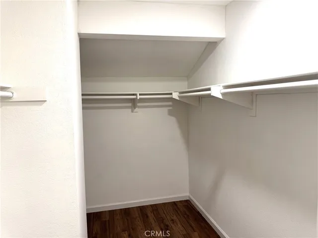 a view of a room with rack on the wall