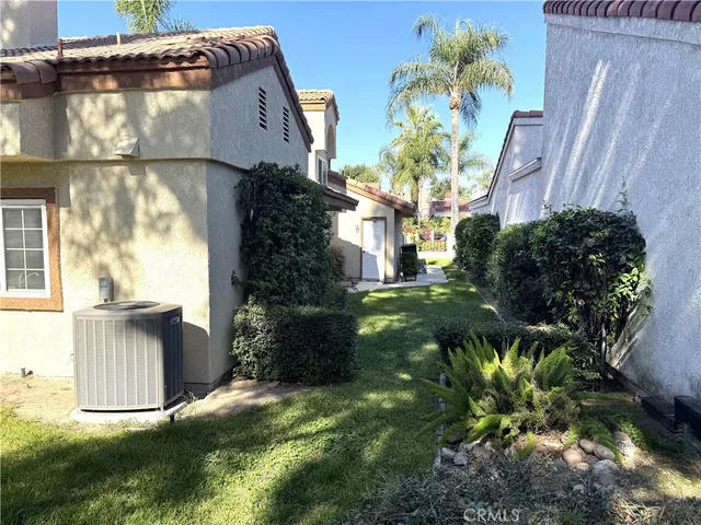 a backyard of a house with lots of green space