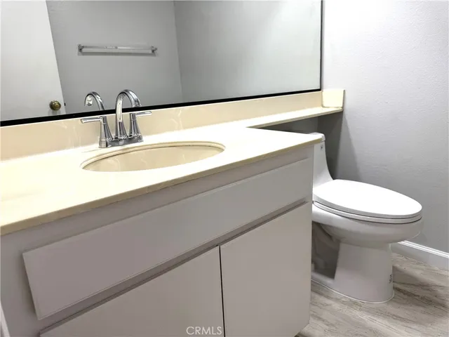 a bathroom with a sink and a toilet