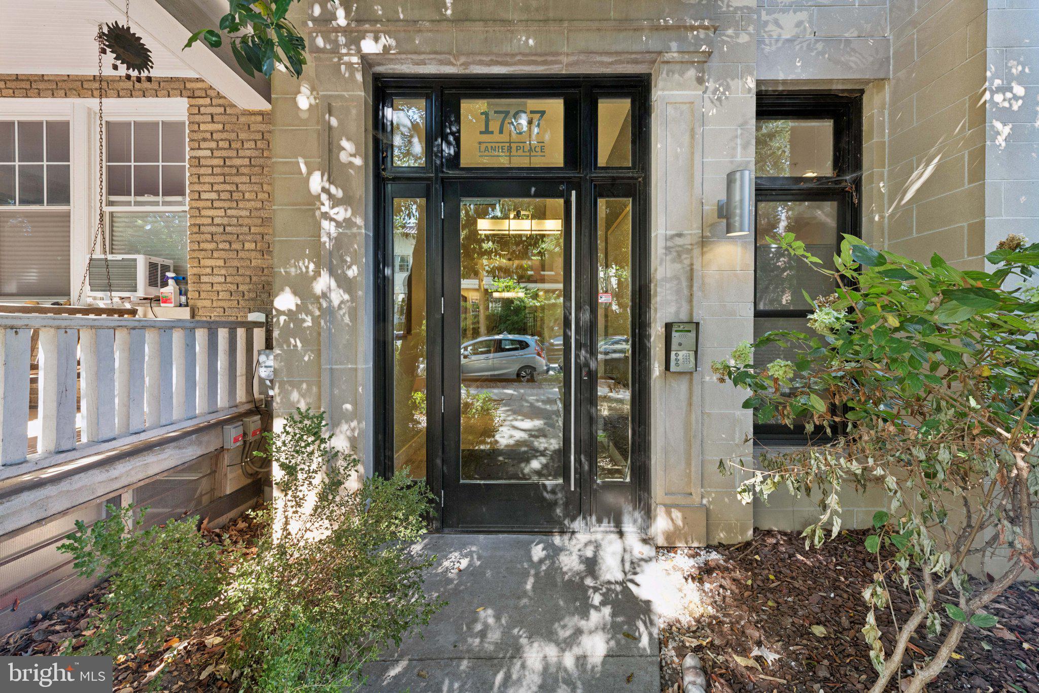 1767 Lanier Place Northwest, Unit 6 Washington, DC 20009 - Photo 4 of 49 front view of a brick house with a large window
