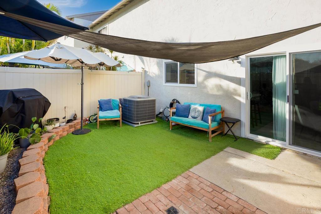 8420 Fanita Drive, Unit 3 Santee, CA 92071 - Photo 17 of 21 a backyard of a house with swing table and chairs
