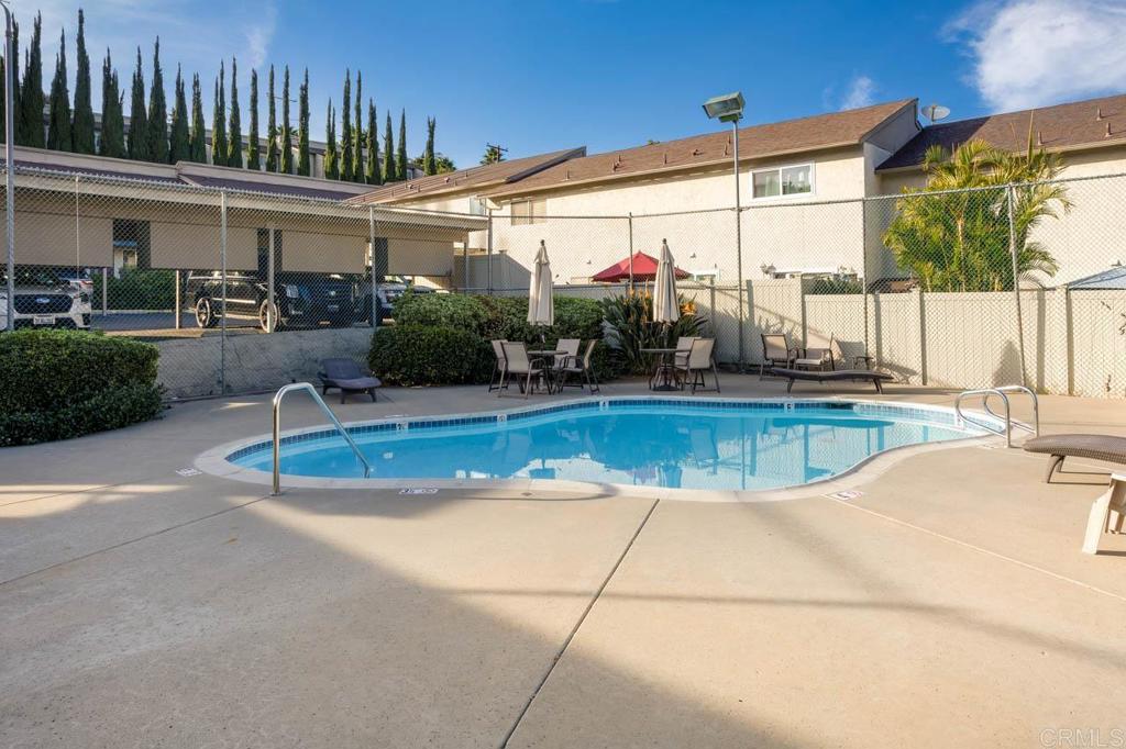 8420 Fanita Drive, Unit 3 Santee, CA 92071 - Photo 20 of 21 a view of a swimming pool with a patio