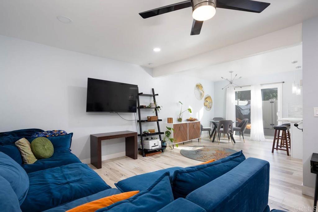 8420 Fanita Drive, Unit 3 Santee, CA 92071 - Photo 2 of 21 a living room with furniture and a flat screen tv