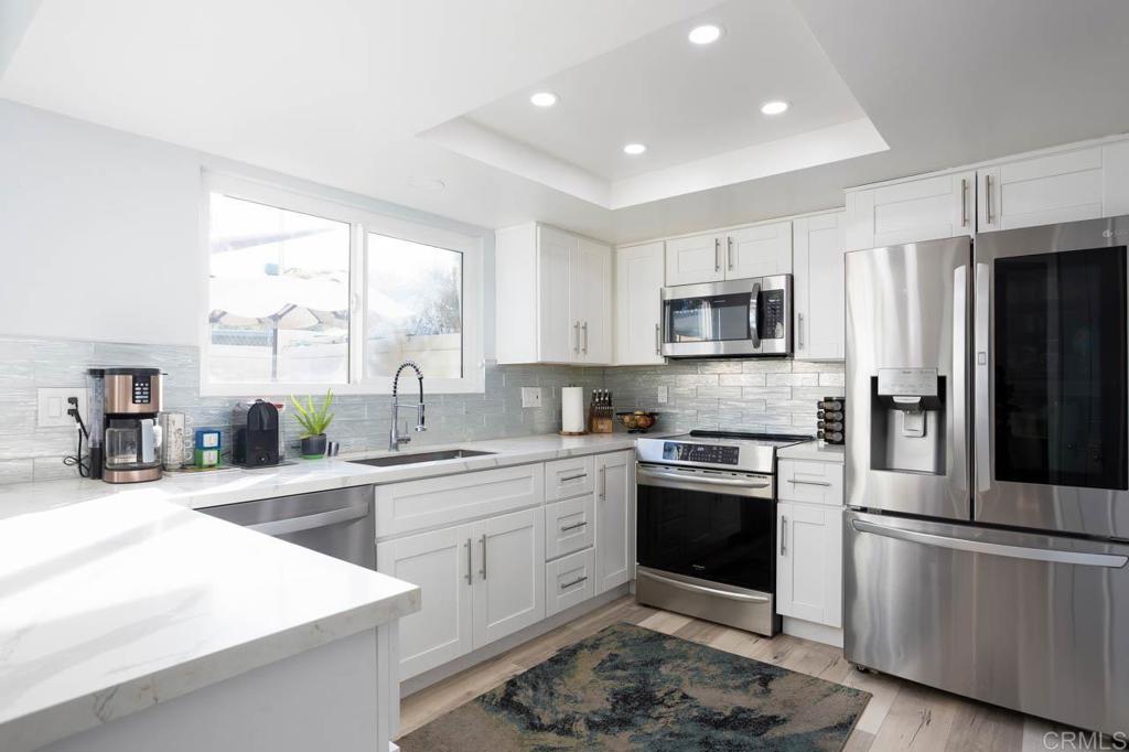 8420 Fanita Drive, Unit 3 Santee, CA 92071 - Photo 7 of 21 a kitchen with a sink stove and refrigerator