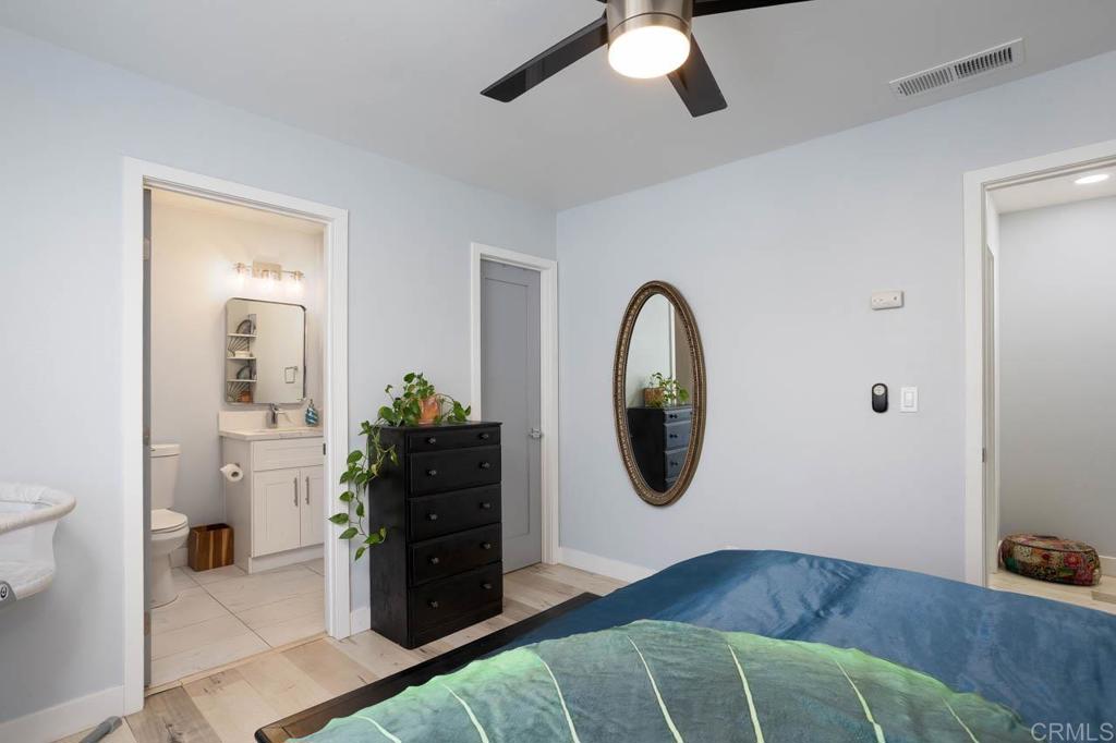 8420 Fanita Drive, Unit 3 Santee, CA 92071 - Photo 10 of 21 a living room with furniture and a mirror