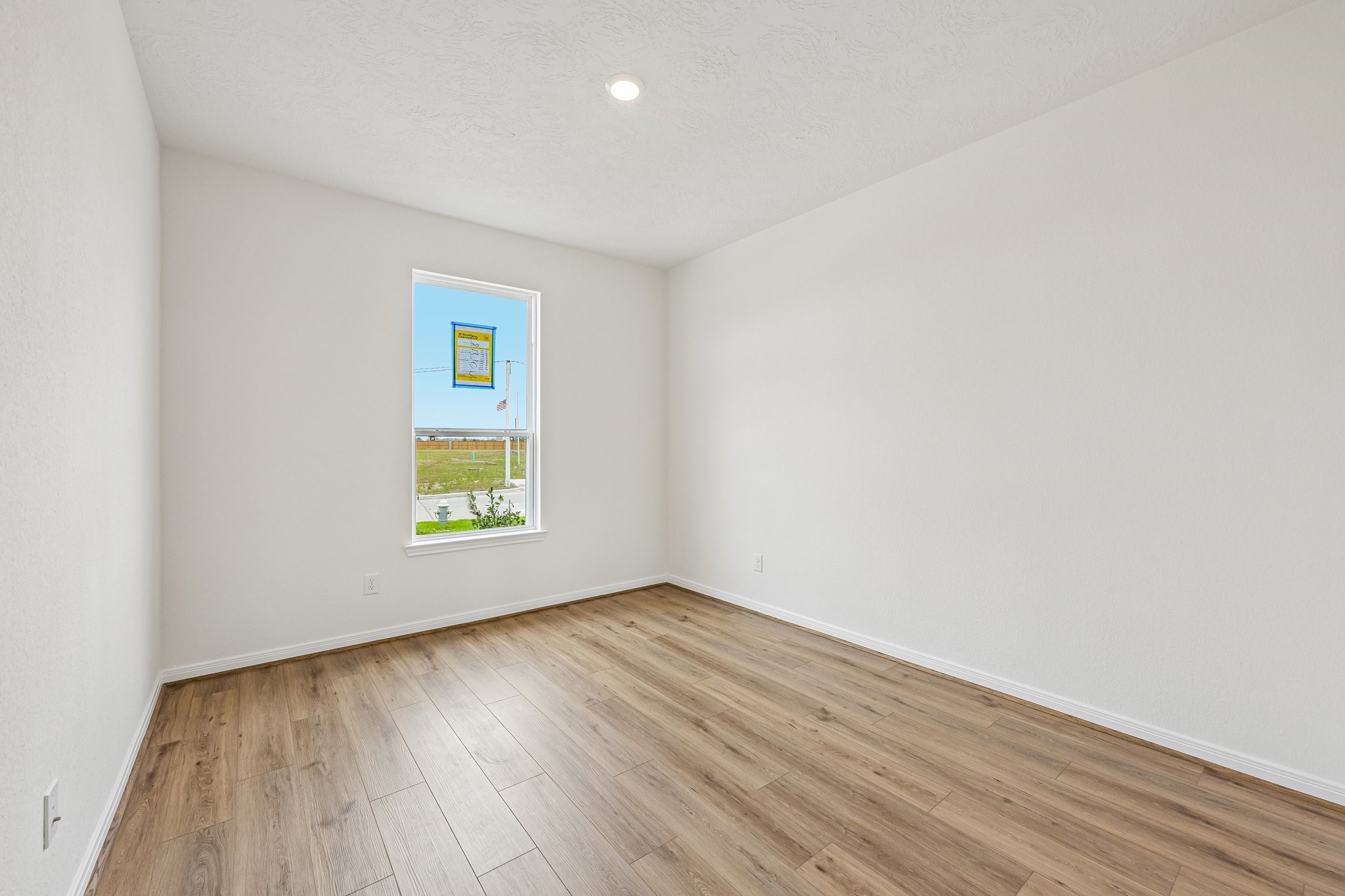 2503 Spruce Hl Road Beasley, TX 77417 - Photo 5 of 25 Located at the front of the home is this versatile den which features great natural light and offers the perfect flexible footprint for a dedicated home office, a quiet reading room, or an intimate formal living space.