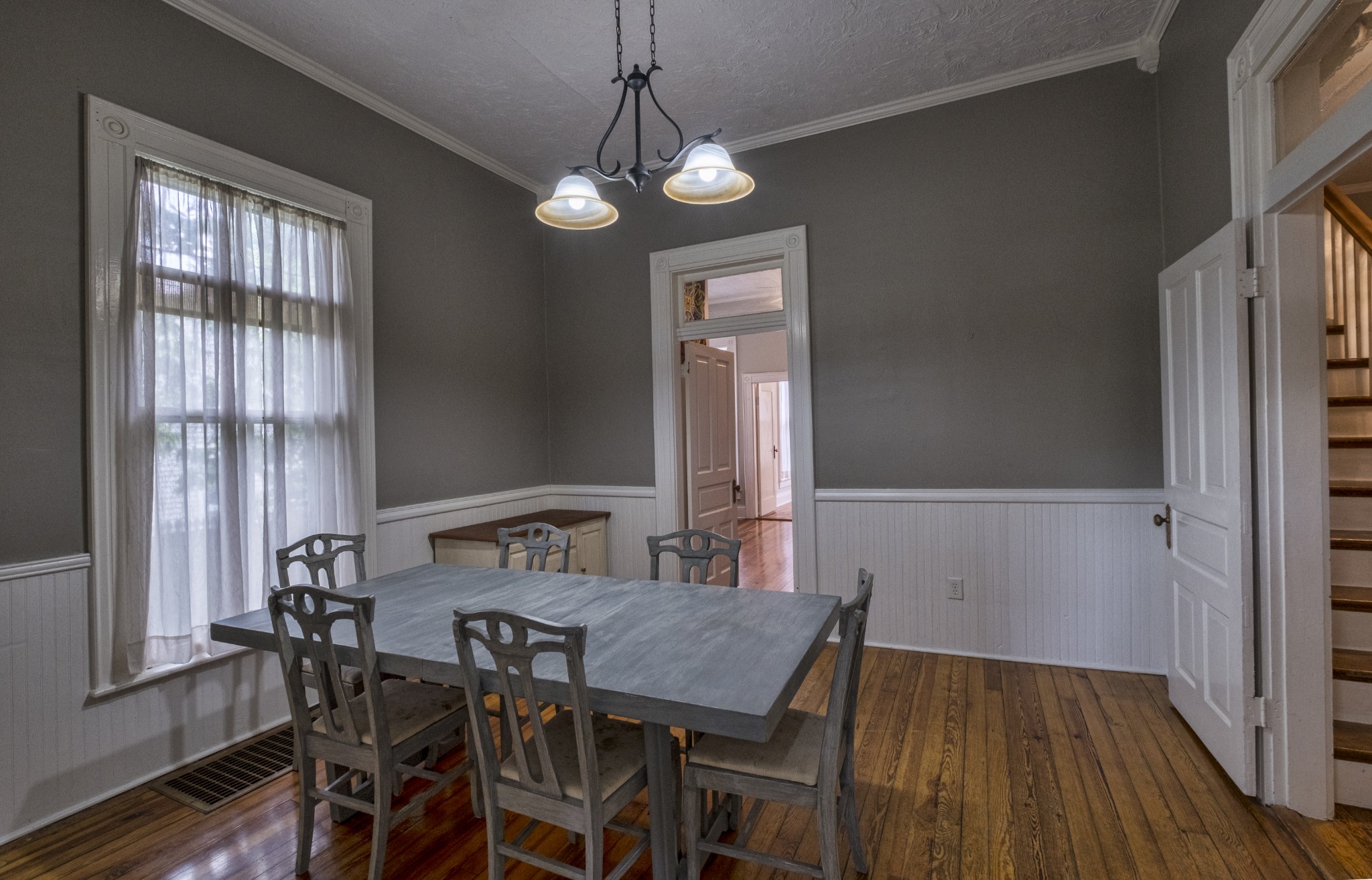 211 North Main Street Springfield, TN 37172 - Photo 14 of 30 a view of a dining room with furniture window and wooden floor